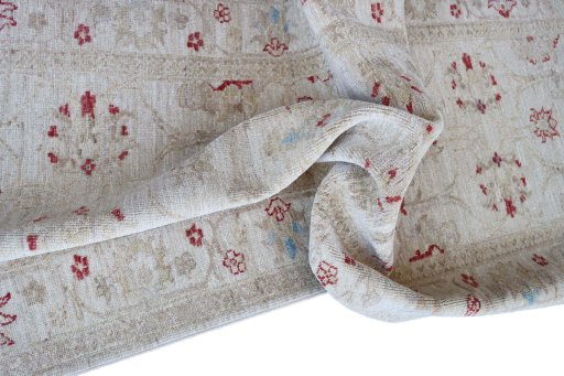 Backside of handmade New Farahan rug showing knot structure and weave density