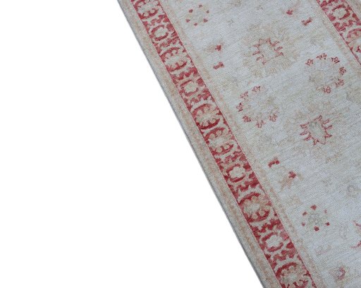 Backside of handmade New Farahan rug showing knot structure and weave density