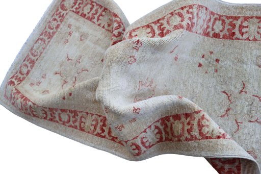 Backside of handmade New Farahan rug showing knot structure and weave density