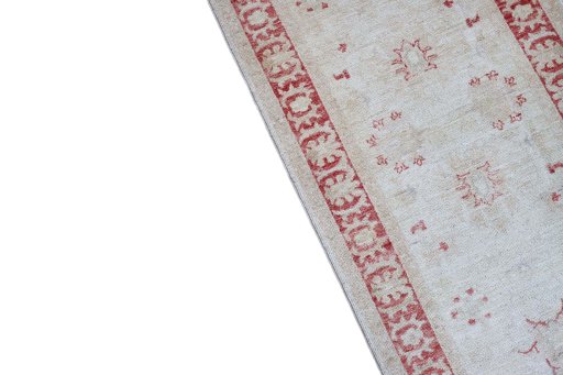 Backside of handmade New Farahan rug showing knot structure and weave density