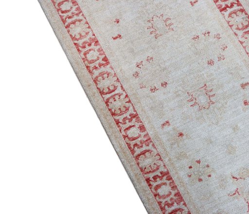 Backside of handmade New Farahan rug showing knot structure and weave density