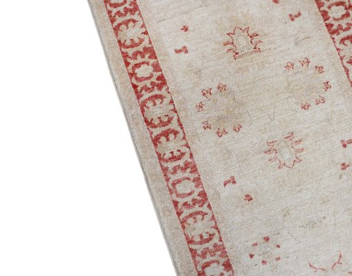 Backside of handmade New Farahan rug showing knot structure and weave density