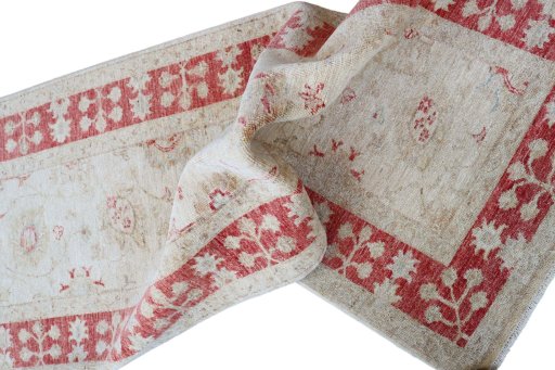 Backside of handmade New Farahan rug showing knot structure and weave density