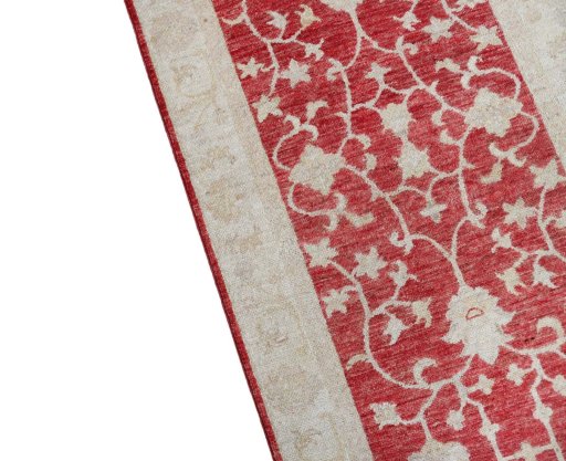Backside of handmade New Farahan rug showing knot structure and weave density