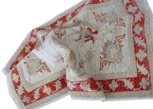 Backside of handmade New Farahan rug showing knot structure and weave density