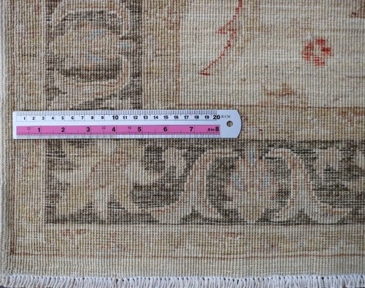 Backside of handmade New Farahan rug showing knot structure and weave density