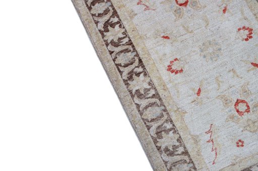 Backside of handmade New Farahan rug showing knot structure and weave density