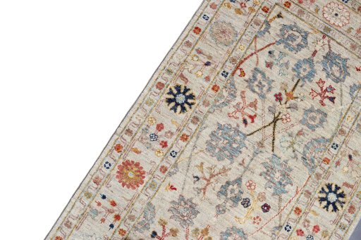 Backside of handmade New Farahan rug showing knot structure and weave density
