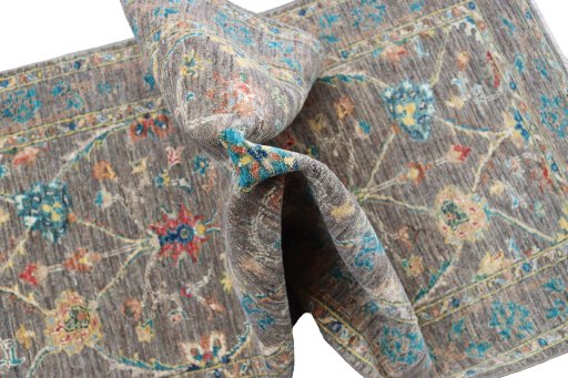 Backside of handmade New Farahan rug showing knot structure and weave density