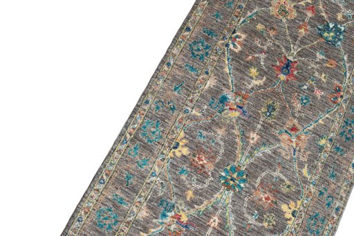 Backside of handmade New Farahan rug showing knot structure and weave density