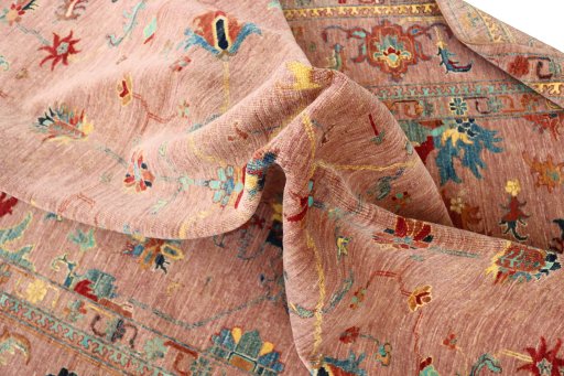 Backside of handmade New Farahan rug showing knot structure and weave density