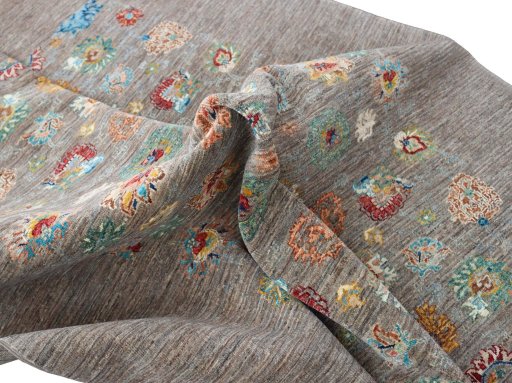 Backside of handmade New Farahan rug showing knot structure and weave density