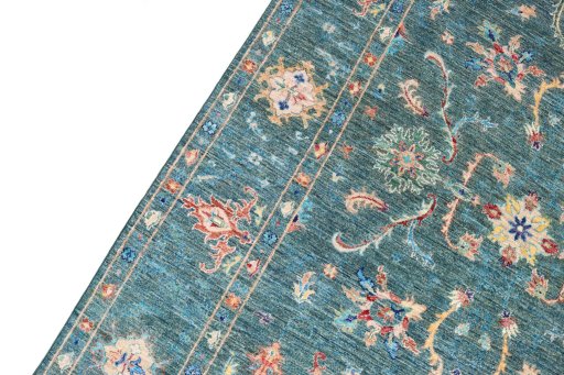 Backside of handmade New Farahan rug showing knot structure and weave density