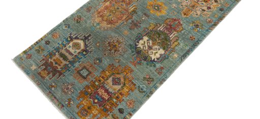 Backside of handmade New Farahan rug showing knot structure and weave density