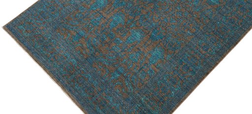 Backside of handmade New Farahan rug showing knot structure and weave density