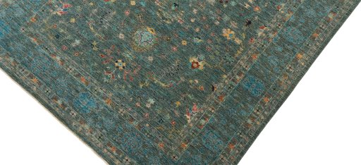 Backside of handmade New Farahan rug showing knot structure and weave density