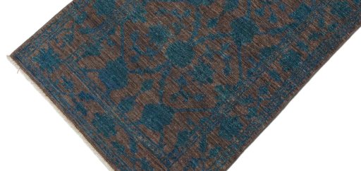 Backside of handmade New Farahan rug showing knot structure and weave density