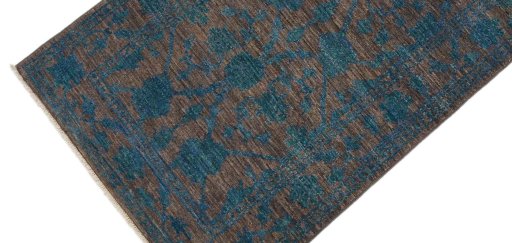 Backside of handmade New Farahan rug showing knot structure and weave density