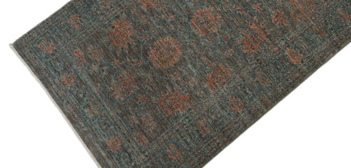 Backside of handmade New Farahan rug showing knot structure and weave density