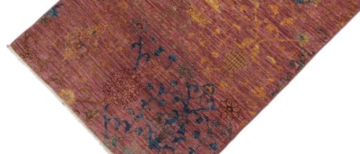Backside of handmade New Farahan rug showing knot structure and weave density
