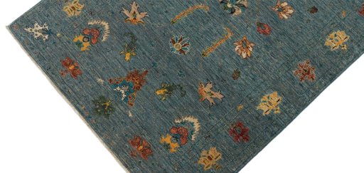 Backside of handmade New Farahan rug showing knot structure and weave density