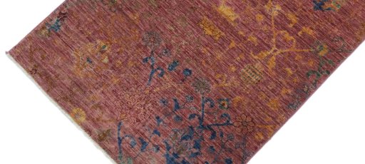Backside of handmade New Farahan rug showing knot structure and weave density