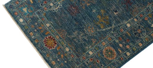 Backside of handmade New Farahan rug showing knot structure and weave density