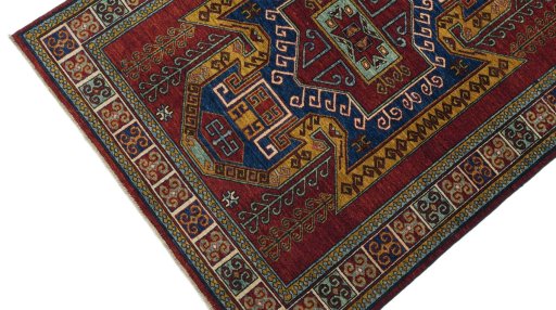 Backside of handmade New Farahan rug showing knot structure and weave density
