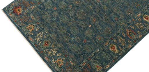 Backside of handmade New Farahan rug showing knot structure and weave density