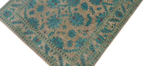 Backside of handmade New Farahan rug showing knot structure and weave density