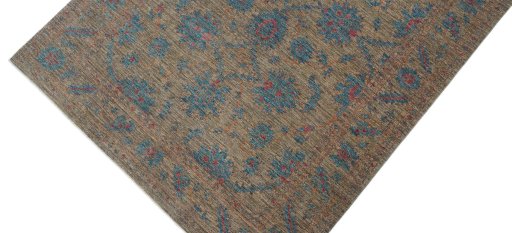 Backside of handmade New Farahan rug showing knot structure and weave density