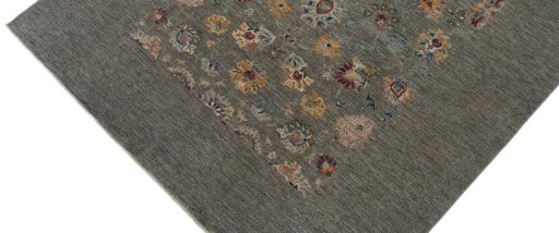 Backside of handmade New Farahan rug showing knot structure and weave density