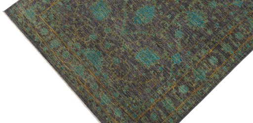 Backside of handmade New Farahan rug showing knot structure and weave density