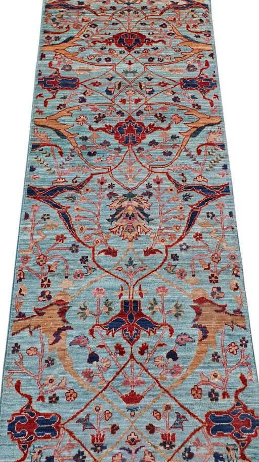 Backside of handmade New Farahan rug showing knot structure and weave density