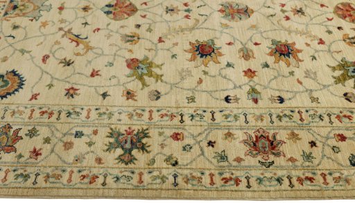 Full view of New Farahan rug from Pakistan, 241 × 167 cm in Beige tones