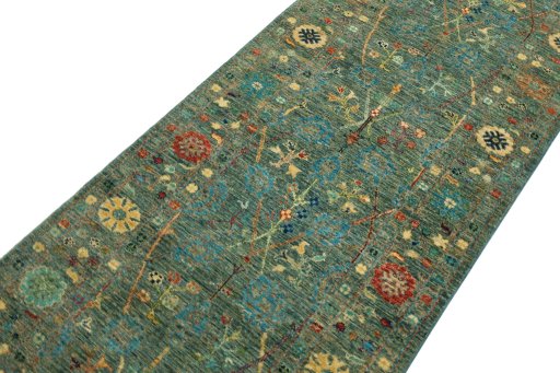 Backside of handmade New Farahan rug showing knot structure and weave density