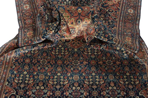 Surface texture of 1930s Farahan rug with natural Wool and intricate pattern