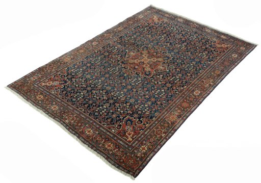 Corner detail of 1930s Farahan rug showing border pattern and Wool pile