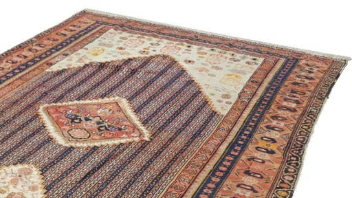 Backside of handmade 1920s Farahan rug showing knot structure and weave density