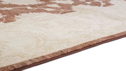 Backside of handmade New Ziegler rug showing knot structure and weave density