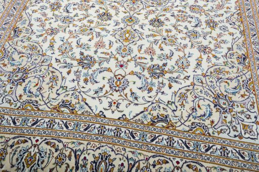 Close-up detail of 2000s Kashan rug from Iran / Persia showing Wool weave
