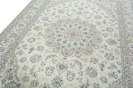 Backside of handmade 2000s Nain rug showing knot structure and weave density