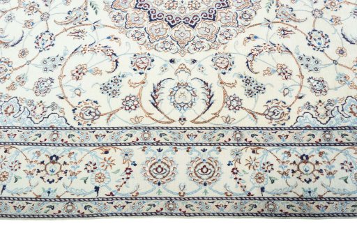 Corner detail of 2000s Nain rug showing border pattern and Wool pile
