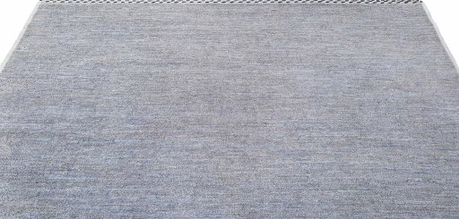 Backside of handmade New Morocco rug showing knot structure and weave density