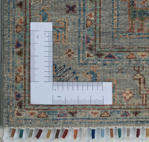 Corner detail of New Samarkand rug showing border pattern and Wool pile