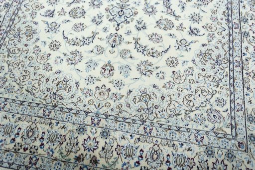 Close-up detail of 2000s Nain rug from Iran / Persia showing Wool weave