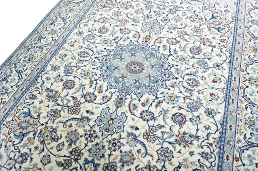 Backside of handmade 2000s Nain rug showing knot structure and weave density
