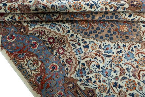 Close-up detail of 2000s Kashmar rug from Iran / Persia showing Wool weave