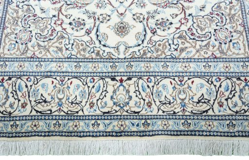 Full view of 2000s Nain rug from Iran / Persia, 297 × 200 cm in Beige tones