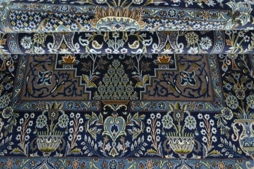 Close-up detail of 2000s Kashan rug from Iran / Persia showing Wool weave